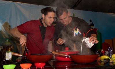 Miami Marlins' pitcher José Fernandez learning a new trade from celebrity Chef James Tahhan @ Taste of Miami 2015